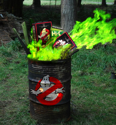 Barrel fire with ghostbusters merchandise inside